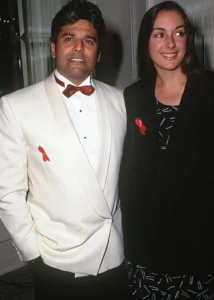 Eric Estrada stands with his wife.