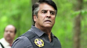 Eric Estrada is standing outside worried.