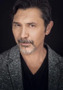 Lou Diamond Phillips is laughing.