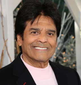 Eric Estrada is laughing.