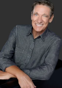 Maury Povich is laughing.