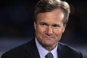 Brian Moynihan is smiling.