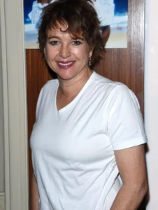 Christy McNichol is laughing.