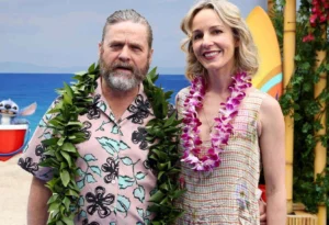 Zach Galifianakis and his wife are wearing fruit necklaces.