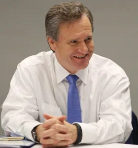 Brian Moynihan is laughing while talking.