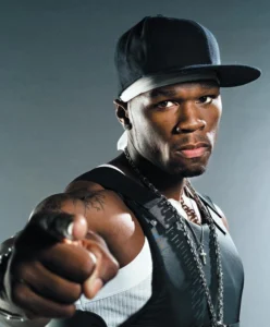 50 Cent is looking at his finger.