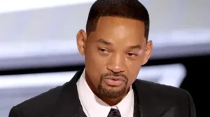 Will Smith is looking down.