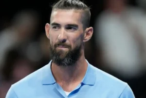 Michael Phelps is smiling.