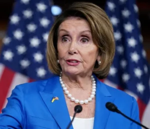 Nancy Pelosi is speaking into the mic.