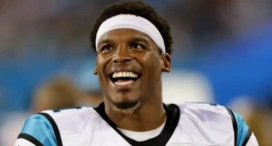 Read more about the article From Touchdowns to Millions Cam Newtons Shocking Net Worth Journey