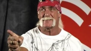Hulk Hogan has his hand raised.