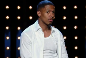 Nick Cannon looks on in surprise.