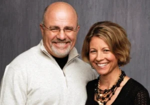 Dave Ramsey is laughing with the girl.