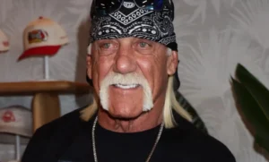 Hulk Hogan is laughing.