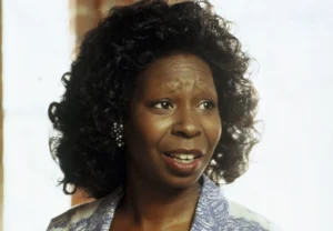 Whoopi Goldberg is acting in a movie.