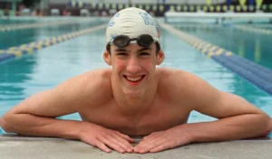 Michael Phelps stands in the swimming pool.