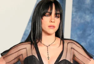 Billie Eilish is watching something.