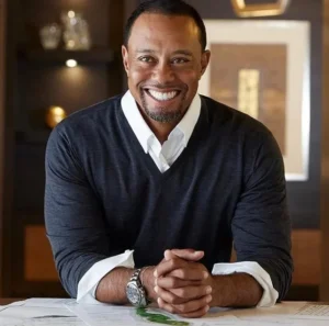 Tiger Woods is sitting at home laughing.