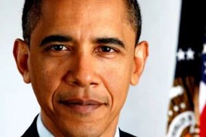 Barack Obama is smiling.