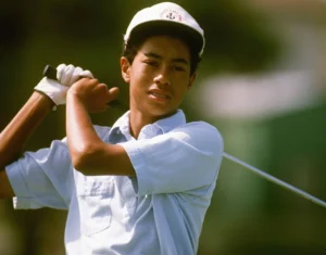 Tiger Woods is playing golf.
