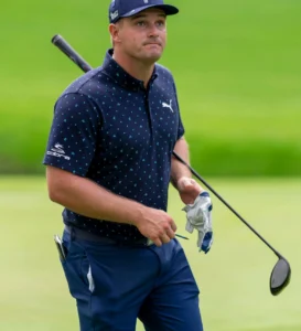 Bryson DeChambeau is wearing golf kit.