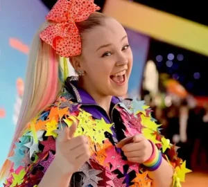 Jojo Siwa is laughing.