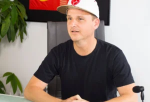 Rob Dyrdek is sitting and talking.
