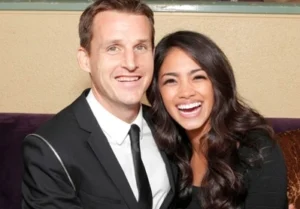 Rob Dyrdek and his wife are laughing.