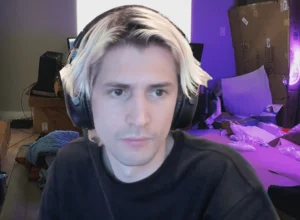 xQc has a headset on.