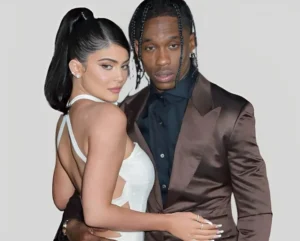 Travis Scott is hugging the girl.