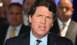 Tucker Carlson is speaking to the media.