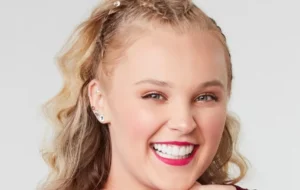 Jojo Siwa is laughing.