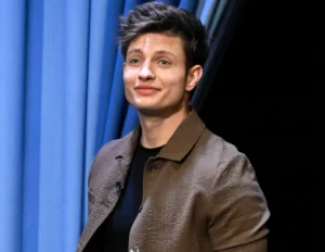 Matt Rife stands smiling.