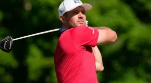 Bryson DeChambeau is playing golf.