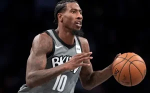 Iman Shumpert is playing basketball.