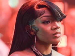 GloRilla looks on in surprise.