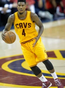 Iman Shumpert is playing basketball.