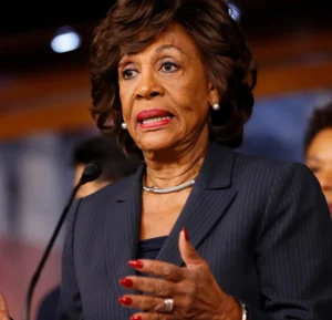 Maxine Waters is speaking into the mic.
