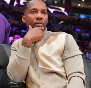 Rich Paul is sitting sadly on the sofa.