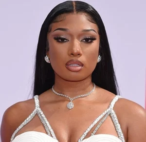 Megan Thee Stallion is wearing white.