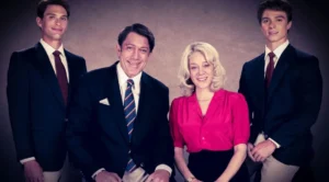Jose Menendez sits with his family, smiling.