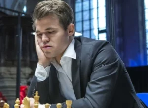 Magnus Carlsen is playing chess.