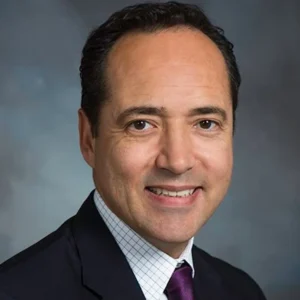 Jose Menendez is laughing.